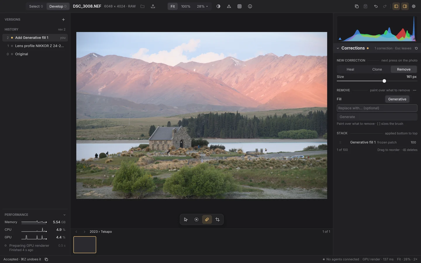 Plate V. A Nikon Z 6 RAW of the Church of the Good Shepherd at Lake Tekapo in Corrections mode, after AI Remove: the Corrections band with Heal, Clone and Remove, its stack holding Generative fill 1, a frozen patch, one of 100; the history at rev 2 with Add Generative fill 1; and the status bar saying ‘Accepted · ⌘Z undoes it’.